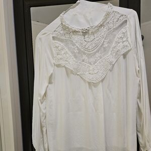 A vintage white blouse.